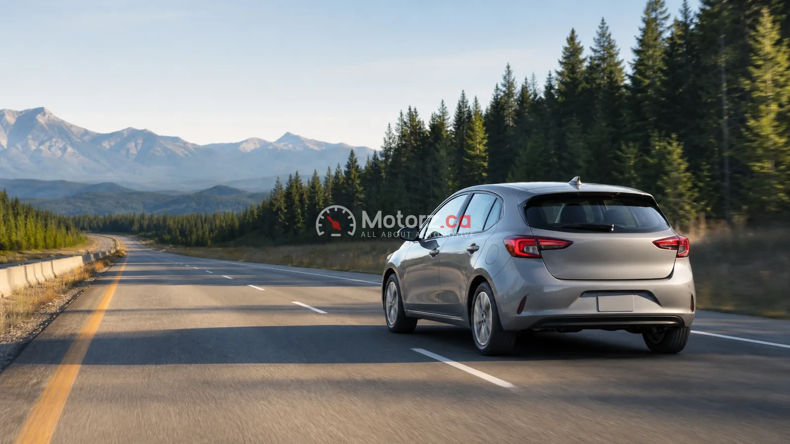 How to Use Less Fuel: Practical Tips for Canadian Drivers 1 A grey compact car driving on a clear highway through a Canadian mountain landscape