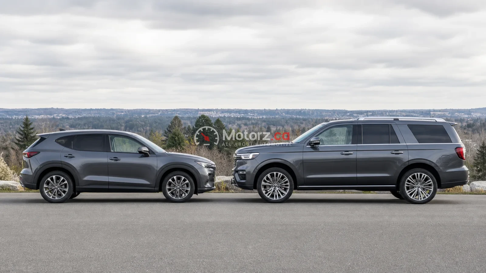 A compact crossover and larger SUV parked side by side for a size comparison