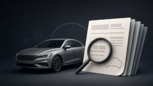 Vehicle beside report pages and a magnifying glass