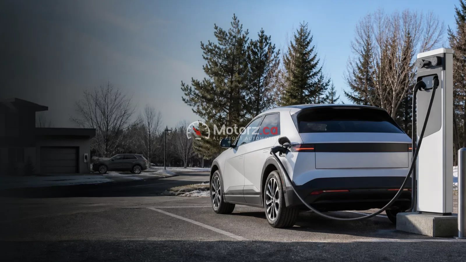 Conceptual image of an electric crossover charging in a Canadian setting