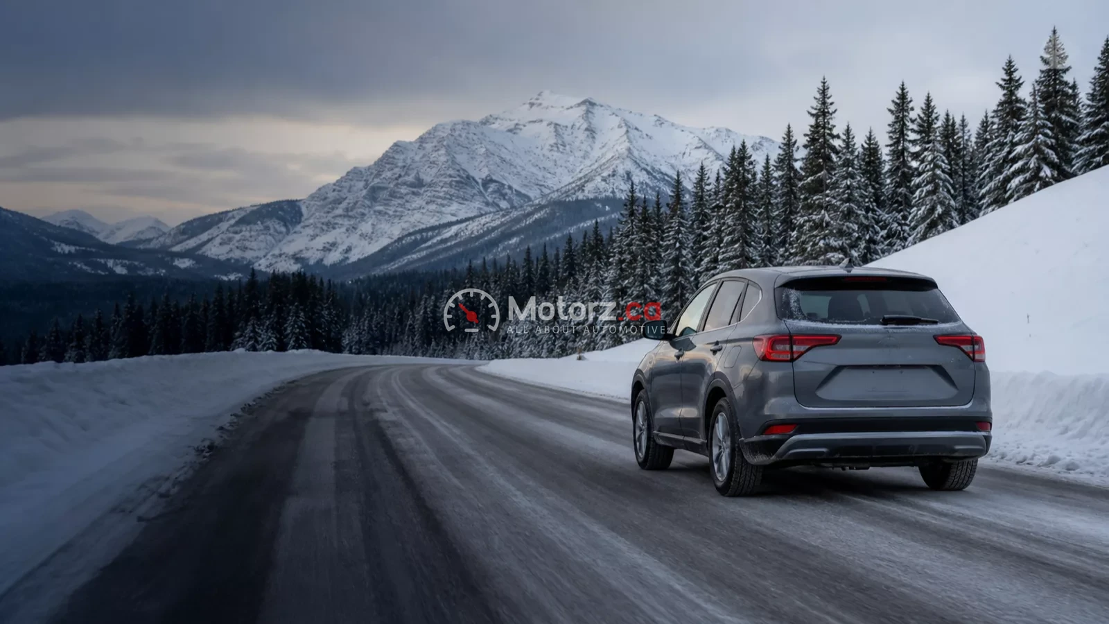 Conceptual image of a crossover travelling carefully on a snowy Canadian mountain road